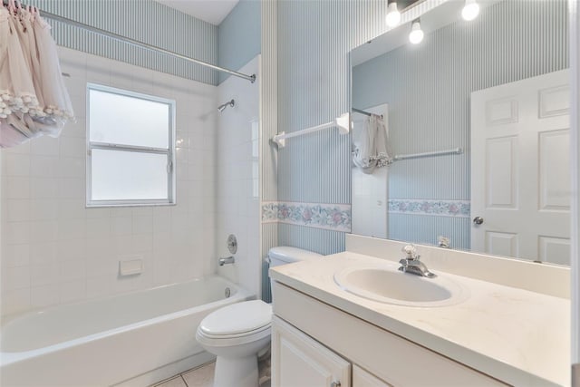 4110 Maplegrove Dr, Orlando, FL 32818 - full bathroom featuring wallpapered walls, vanity, and bathtub / shower combination