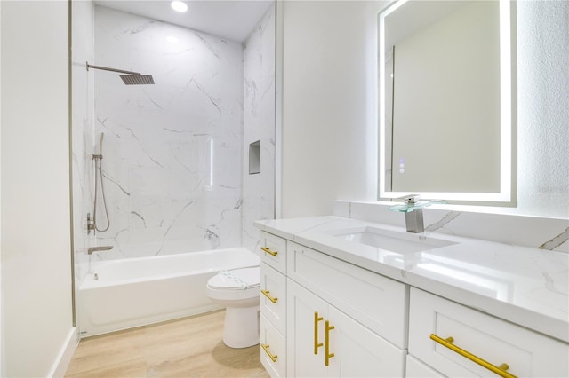 3507 W Jefferson St, Orlando, FL 32805 - bathroom featuring vanity, wood finished floors, and tub / shower combination