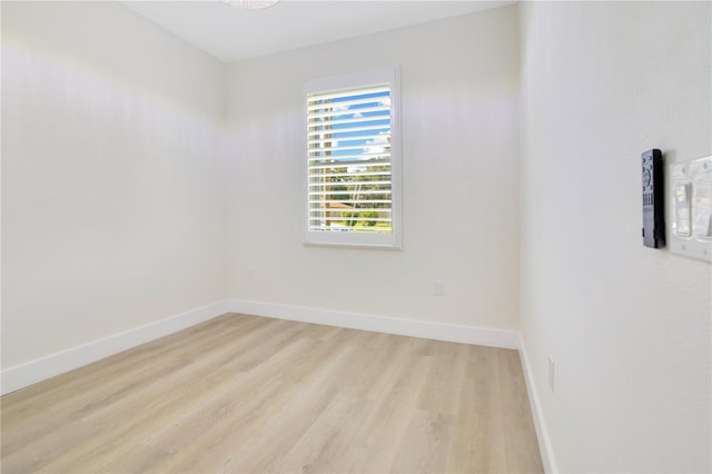 3507 W Jefferson St, Orlando, FL 32805 - unfurnished room featuring light wood-style floors and baseboards