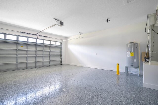 3507 W Jefferson St, Orlando, FL 32805 - garage with a garage door opener and water heater
