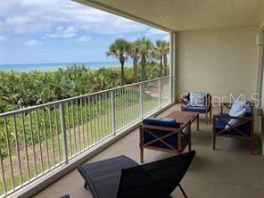 225 N Atlantic Ave Unit 205, Cocoa Beach, FL 32931 - balcony with an outdoor hangout area