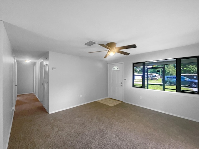 2575 King Ave, Auburndale, FL 33823 - carpeted spare room featuring ceiling fan and baseboards