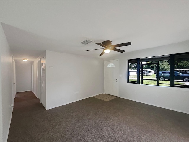 2575 King Ave, Auburndale, FL 33823 - spare room with carpet floors and ceiling fan
