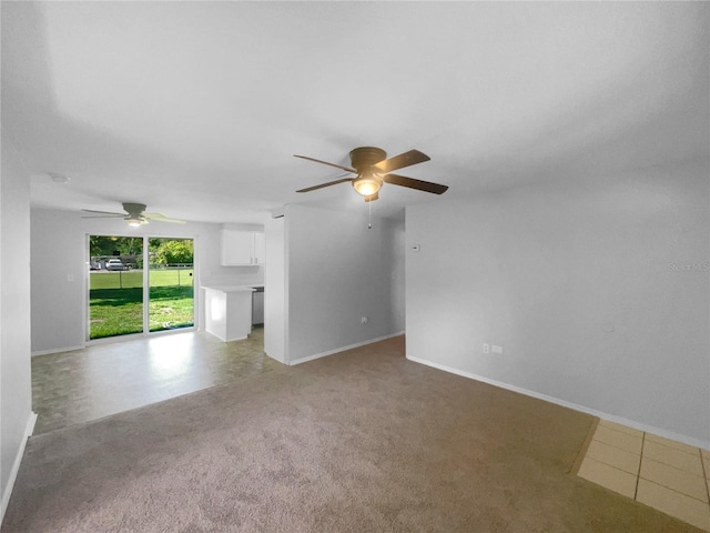 2575 King Ave, Auburndale, FL 33823 - unfurnished living room with ceiling fan and light carpet