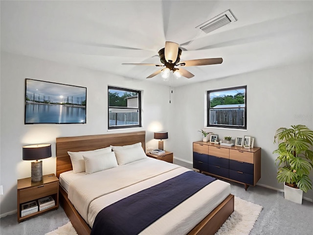 2575 King Ave, Auburndale, FL 33823 - bedroom with a ceiling fan and light colored carpet