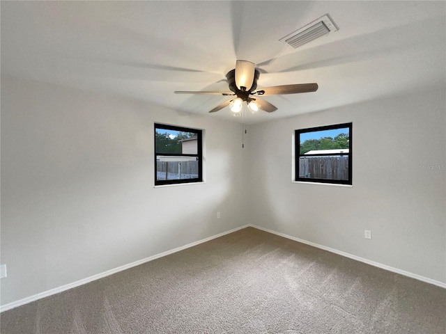 2575 King Ave, Auburndale, FL 33823 - carpeted empty room with a ceiling fan and baseboards