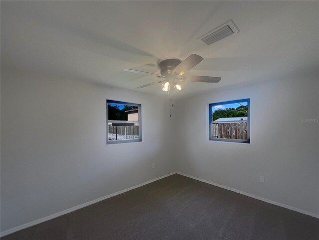 2575 King Ave, Auburndale, FL 33823 - empty room with ceiling fan and dark carpet