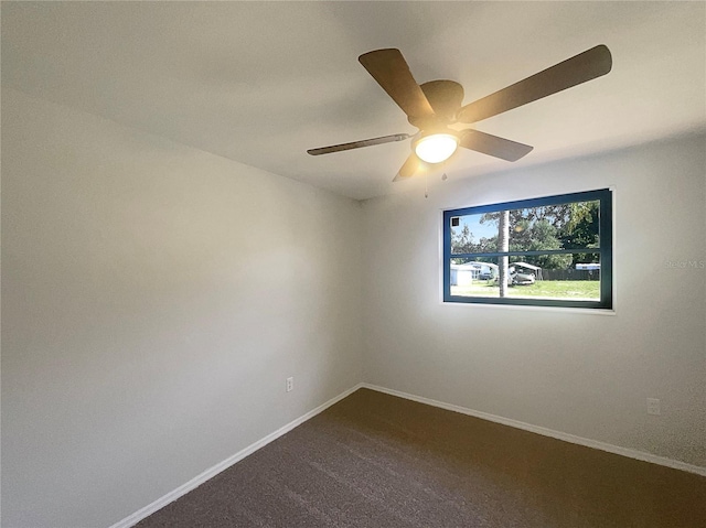 2575 King Ave, Auburndale, FL 33823 - empty room with a ceiling fan and dark colored carpet