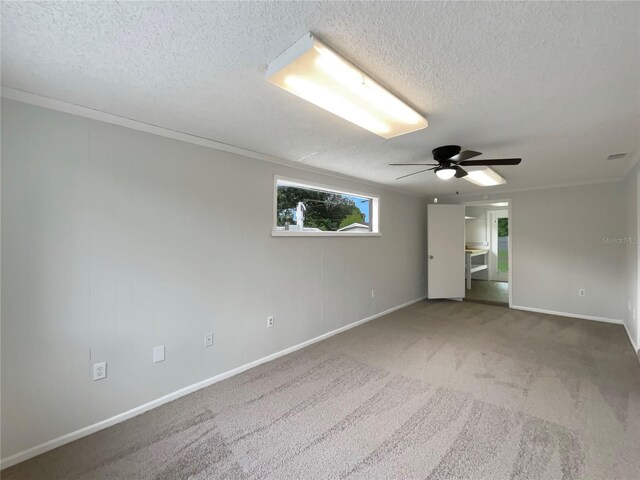2575 King Ave, Auburndale, FL 33823 - carpeted empty room featuring a ceiling fan, a textured ceiling, and ornamental molding