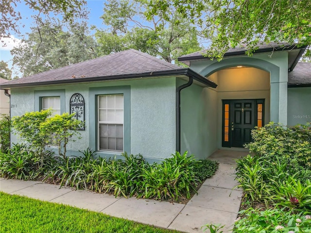 2353 Kingscrest Cir, Apopka, FL 32712 - property entrance featuring stucco siding