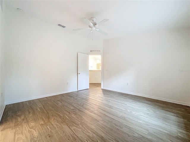 2353 Kingscrest Cir, Apopka, FL 32712 - empty room featuring wood finished floors and a ceiling fan