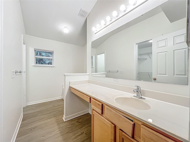 2353 Kingscrest Cir, Apopka, FL 32712 - bathroom with wood finished floors and vanity