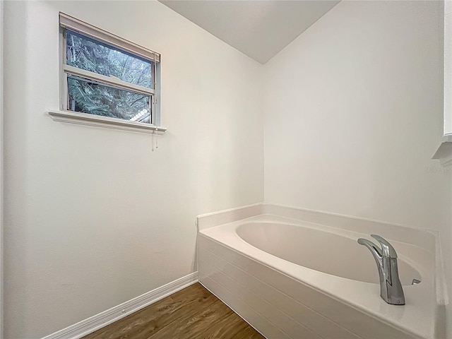 2353 Kingscrest Cir, Apopka, FL 32712 - full bath with a garden tub and wood finished floors