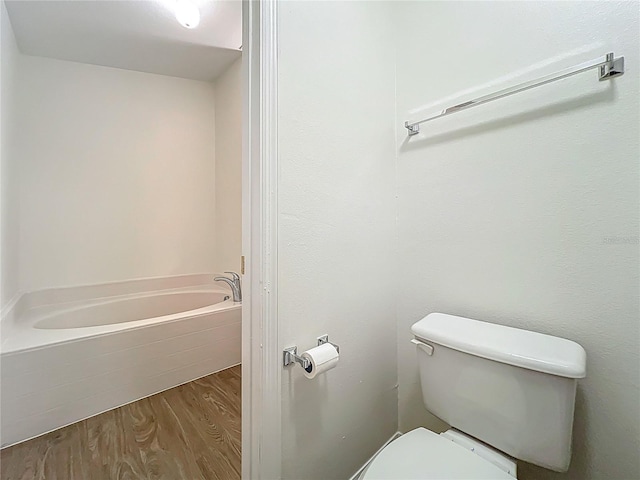 2353 Kingscrest Cir, Apopka, FL 32712 - bathroom with wood finished floors and a bath