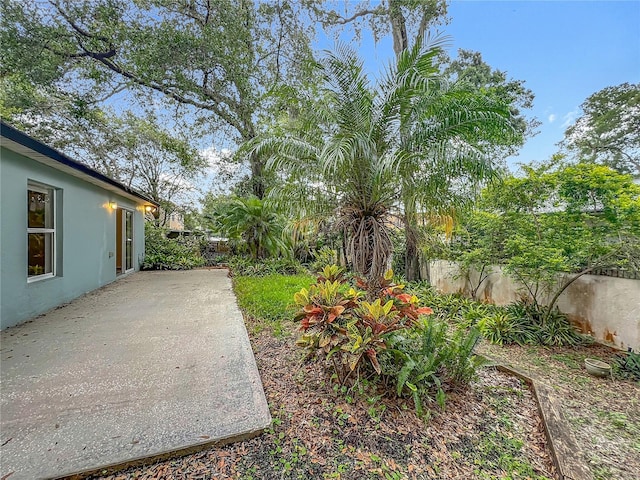 2353 Kingscrest Cir, Apopka, FL 32712 - fenced backyard with a patio area