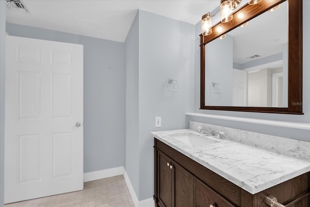 322 E Central Blvd Unit 614, Orlando, FL 32801 - bathroom with vanity and baseboards