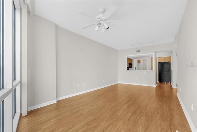 322 E Central Blvd Unit 614, Orlando, FL 32801 - spare room with ceiling fan and light wood-type flooring