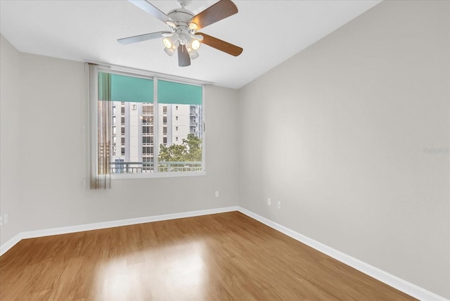 322 E Central Blvd Unit 614, Orlando, FL 32801 - unfurnished room with wood finished floors and ceiling fan
