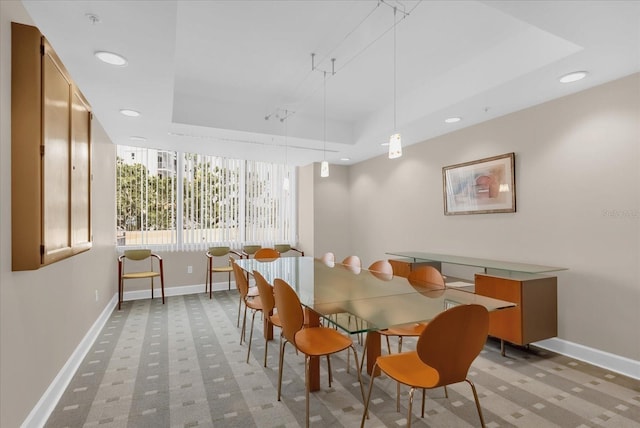 322 E Central Blvd Unit 614, Orlando, FL 32801 - dining room with light carpet, a raised ceiling, and recessed lighting