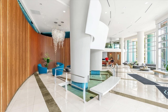 322 E Central Blvd Unit 614, Orlando, FL 32801 - lobby featuring wood walls and recessed lighting