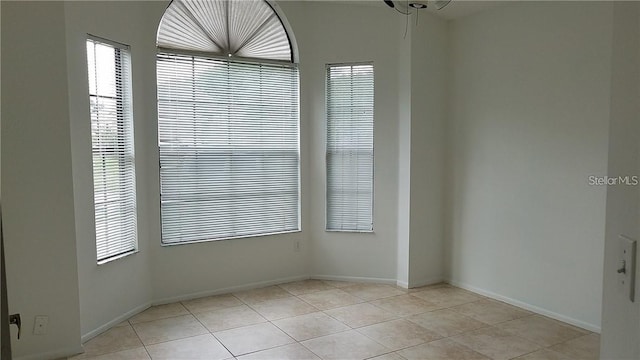 1524 Crawford Dr, Apopka, FL 32703 - unfurnished room with light tile patterned flooring and plenty of natural light