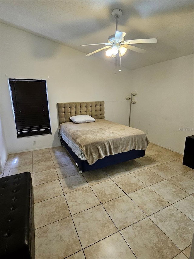 1524 Crawford Dr, Apopka, FL 32703 - bedroom featuring light tile patterned floors, ceiling fan, and a textured ceiling