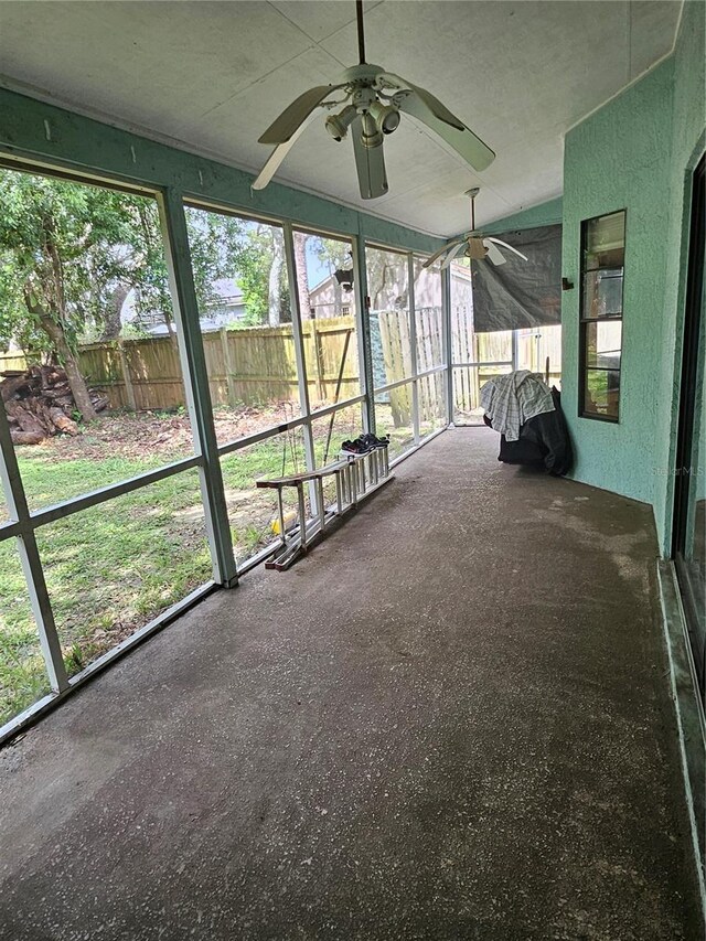 1524 Crawford Dr, Apopka, FL 32703 - unfurnished sunroom with a ceiling fan and lofted ceiling