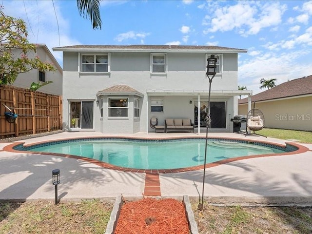 961 SW 98th Ave, Pembroke Pines, FL 33025 - view of pool with a patio area and an outdoor hangout area