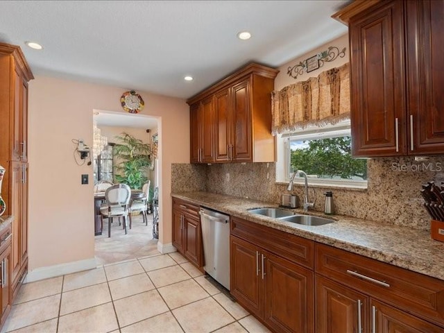 961 SW 98th Ave, Pembroke Pines, FL 33025 - kitchen featuring stainless steel dishwasher, tasteful backsplash, light stone counters, recessed lighting, and light tile patterned flooring