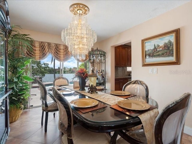 961 SW 98th Ave, Pembroke Pines, FL 33025 - dining room featuring a chandelier, a water view, and light tile patterned floors