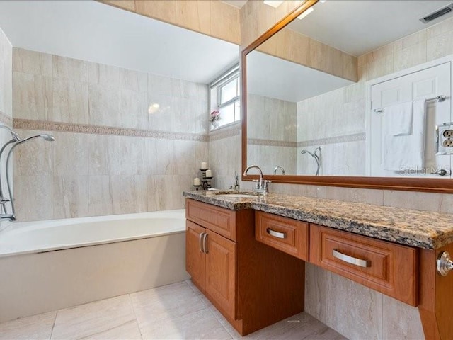 961 SW 98th Ave, Pembroke Pines, FL 33025 - full bathroom featuring tile walls, vanity, shower / bathtub combination, and tile patterned floors