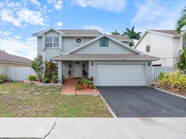 961 SW 98th Ave, Pembroke Pines, FL 33025 - traditional home with stucco siding, asphalt driveway, and an attached garage