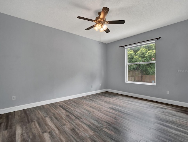 1712 Riveredge Rd, Oviedo, FL 32766 - empty room with dark wood-style flooring, ceiling fan, and a textured ceiling