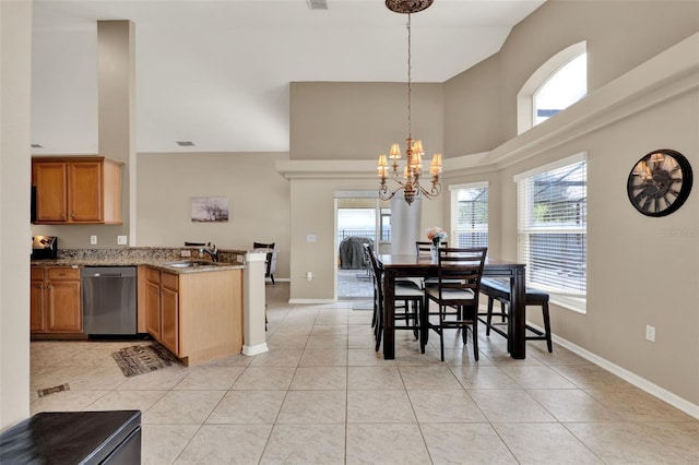211 Tavestock Loop, Winter Springs, FL 32708 - dining room featuring high vaulted ceiling, a chandelier, and light tile patterned flooring