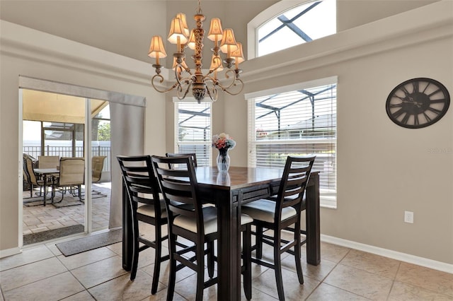 211 Tavestock Loop, Winter Springs, FL 32708 - dining space with light tile patterned floors and a chandelier