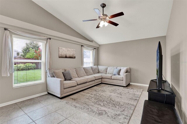 211 Tavestock Loop, Winter Springs, FL 32708 - living room with lofted ceiling, a ceiling fan, and light tile patterned flooring