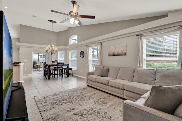 211 Tavestock Loop, Winter Springs, FL 32708 - living area with light tile patterned floors, a chandelier, ceiling fan, and high vaulted ceiling