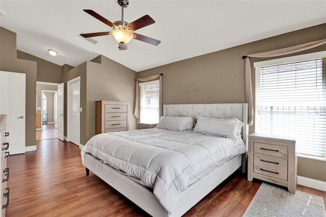 211 Tavestock Loop, Winter Springs, FL 32708 - bedroom with wood finished floors, lofted ceiling, a closet, and a ceiling fan