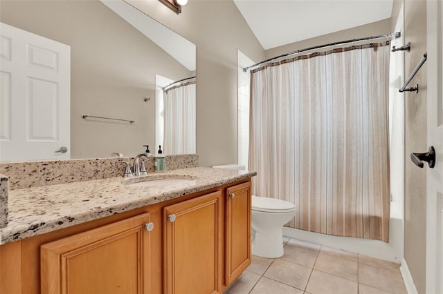 211 Tavestock Loop, Winter Springs, FL 32708 - bathroom featuring vaulted ceiling, tile patterned flooring, vanity, and shower / tub combo with curtain