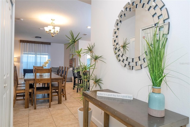 3193 Pequod Pl, Kissimmee, FL 34746 - dining area with a chandelier and light tile patterned floors