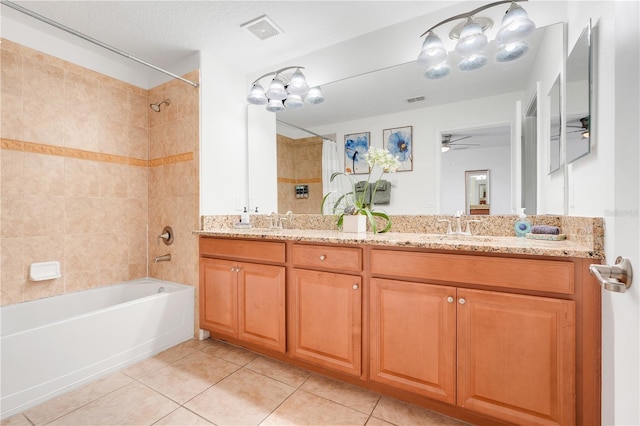 3193 Pequod Pl, Kissimmee, FL 34746 - full bathroom featuring tile patterned flooring, tub / shower combination, double vanity, and ceiling fan