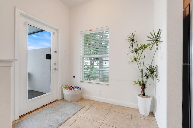 3193 Pequod Pl, Kissimmee, FL 34746 - entryway featuring tile patterned floors and baseboards