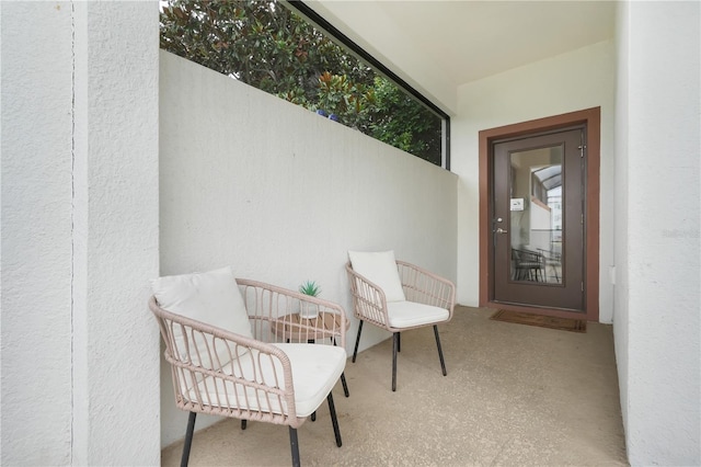 3193 Pequod Pl, Kissimmee, FL 34746 - view of exterior entry with a balcony and stucco siding