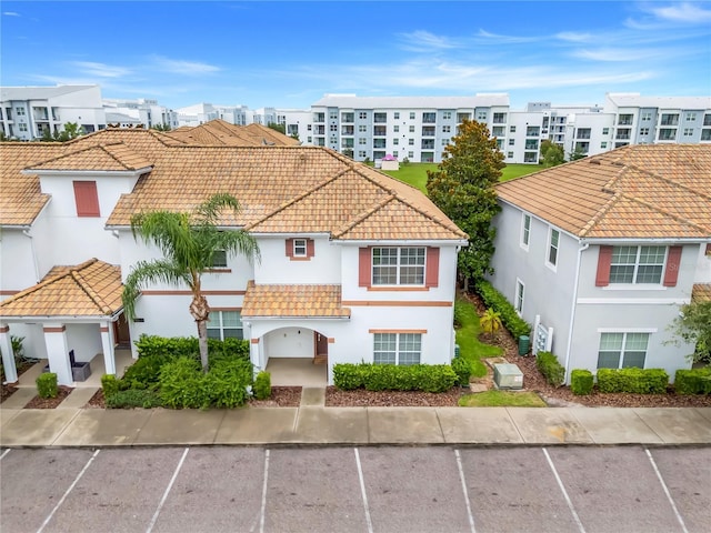 3193 Pequod Pl, Kissimmee, FL 34746 - view of property with uncovered parking