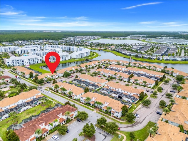 3193 Pequod Pl, Kissimmee, FL 34746 - aerial view of property and surrounding area featuring a large body of water and nearby suburban area