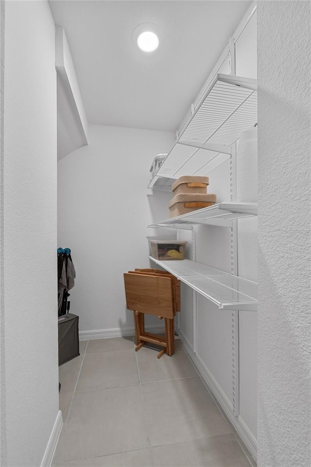 944 Benjamin Trl, Davenport, FL 33837 - spacious closet with light tile patterned floors