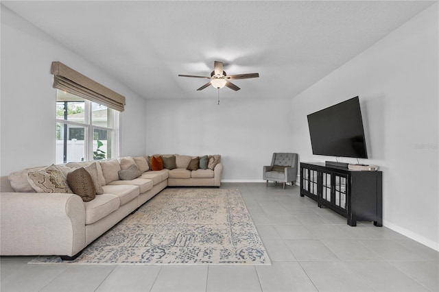 944 Benjamin Trl, Davenport, FL 33837 - tiled living area with ceiling fan and baseboards