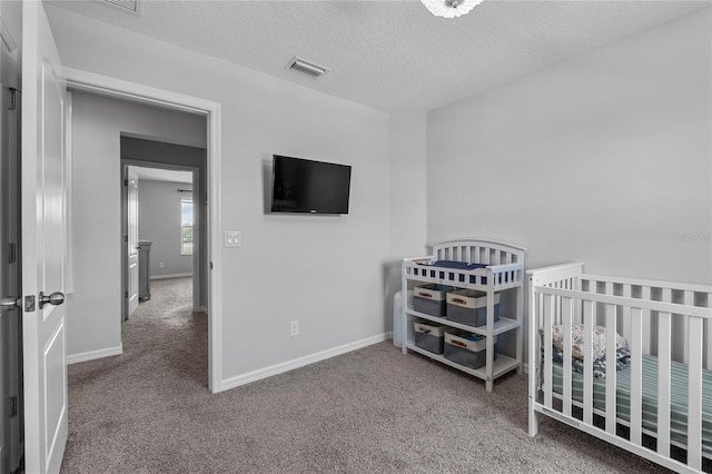 944 Benjamin Trl, Davenport, FL 33837 - carpeted bedroom featuring a textured ceiling and baseboards