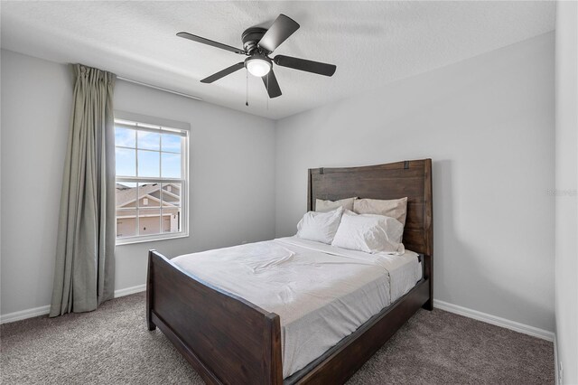 944 Benjamin Trl, Davenport, FL 33837 - bedroom featuring carpet flooring, ceiling fan, and a textured ceiling