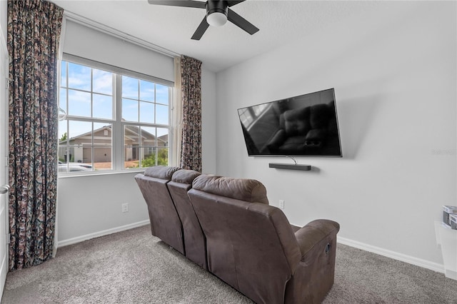 944 Benjamin Trl, Davenport, FL 33837 - carpeted living area with baseboards and ceiling fan